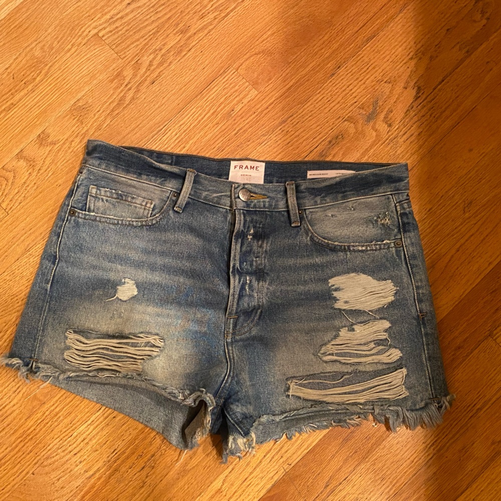 Frame distresses light wash jean shorts